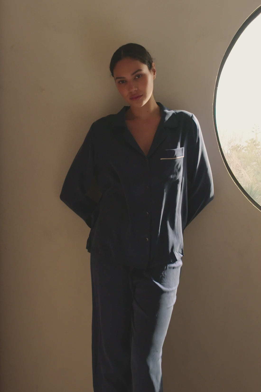 Model is wearing Inez Washable Silk Long PJ Set in navy/ivory.