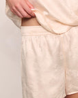 Model is wearing Washable Silk Jacquard Cami & Short PJ Set in Floral Vine Peach Dust