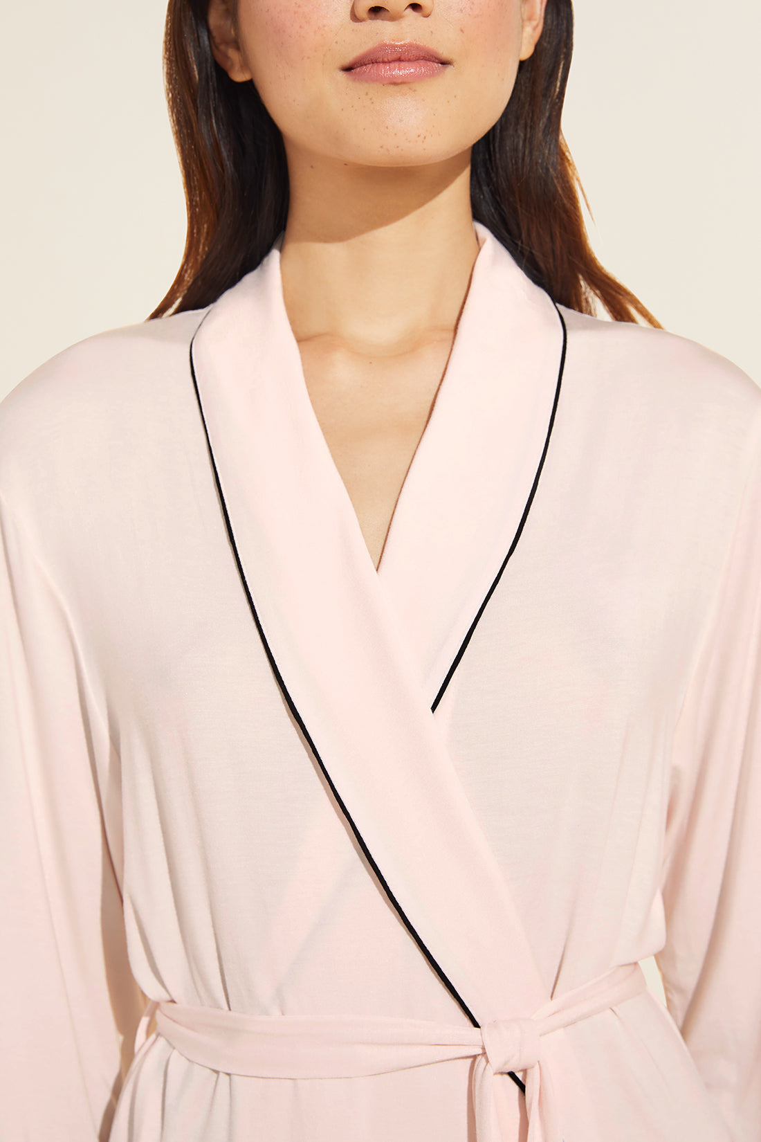 Model is wearing the Gisele TENCEL™ Modal Robe in sorbet pink/black.