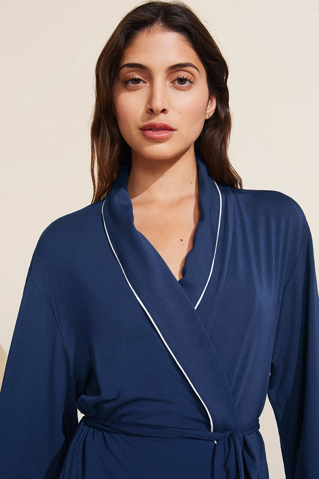 Model is wearing the Gisele TENCEL™ Modal Robe in navy/ivory.