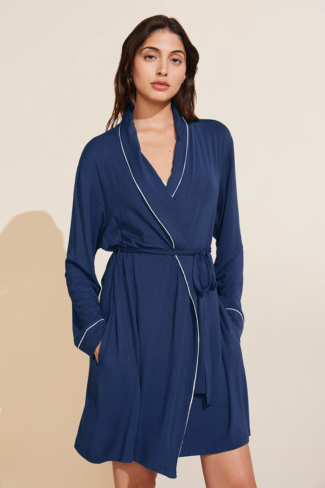 Model is wearing the Gisele TENCEL™ Modal Robe in navy/ivory.