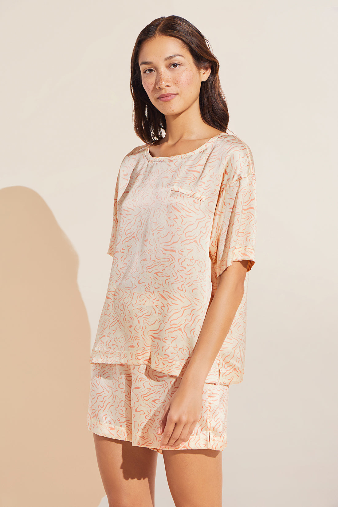 Model wears Inez Washable Silk Printed Short Sleeve Tee & Boxer PJ Set in Marble Rose Cloud.