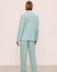 Model is wearing Gisele Tencel™ Modal Long Pj Set in Canal Blue/Ivory