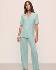 Model is wearing Gisele Tencel™ Modal Short Sleeve & Pant Pj Set in Canal Blue/Ivory