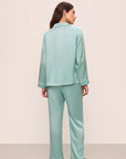 Model is wearing Inez Washable Silk Long Pj Set in Canal Blue/Ivory
