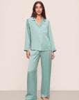 Model is wearing Inez Washable Silk Long Pj Set in Canal Blue/Ivory
