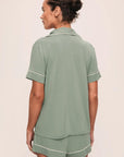 Model is wearing Gisele TENCEL™ Modal Relaxed Short PJ Set in Eucalyptus/Ivory