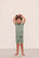 Model is wearing Kids TENCEL™ Modal Unisex Short PJ Set in Eucalyptus/Ivory