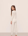 Model is wearing Kids Printed TENCEL™ Modal Unisex Long PJ Set in Heritage Stripe Lt Htr Grey/Pe