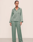 Model is wearing Inez Washable Silk Long PJ Set in Eucalyptus/Ivory