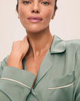 Model is wearing Inez Washable Silk Long PJ Set in Eucalyptus/Ivory