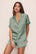 Model is wearing Inez Washable Silk Short PJ Set in Eucalyptus/Ivory