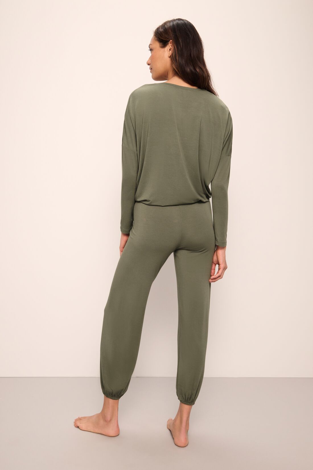 Model wears Gisele TENCEL™ Modal Slouchy PJ Set in moss/ivory.