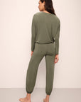 Model wears Gisele TENCEL™ Modal Slouchy PJ Set in moss/ivory.
