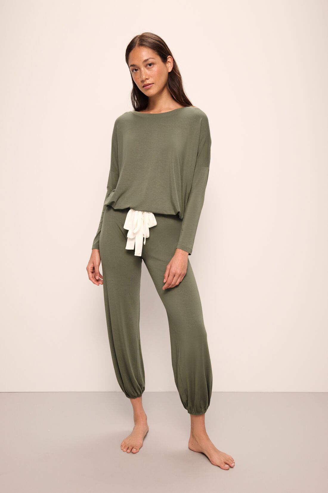 Model wears Gisele TENCEL™ Modal Slouchy PJ Set in moss/ivory.