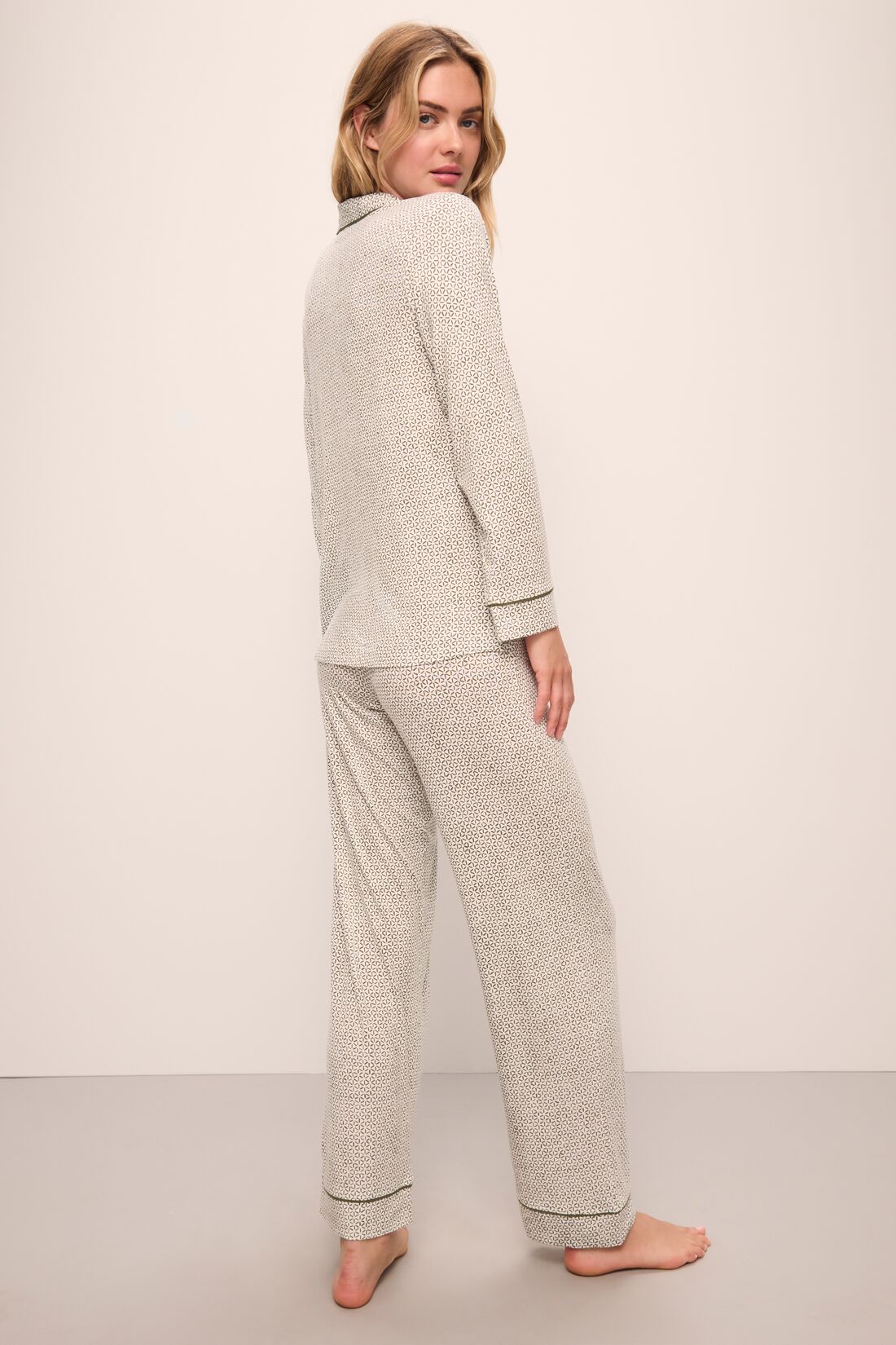 Model wears Gisele Printed TENCEL™ Modal Long PJ Set in Ella Spark/Moss.