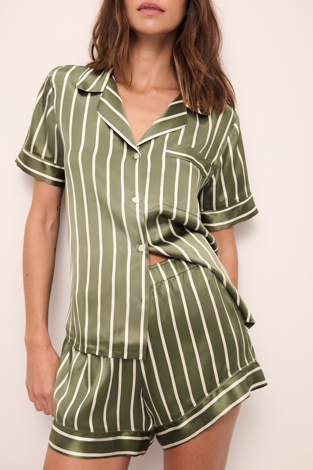Model wears Inez Washable Silk Printed Short PJ Set in Classic Stripe Moss/Moss.