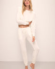Model wears Cozy Time Jogger in Ivory.