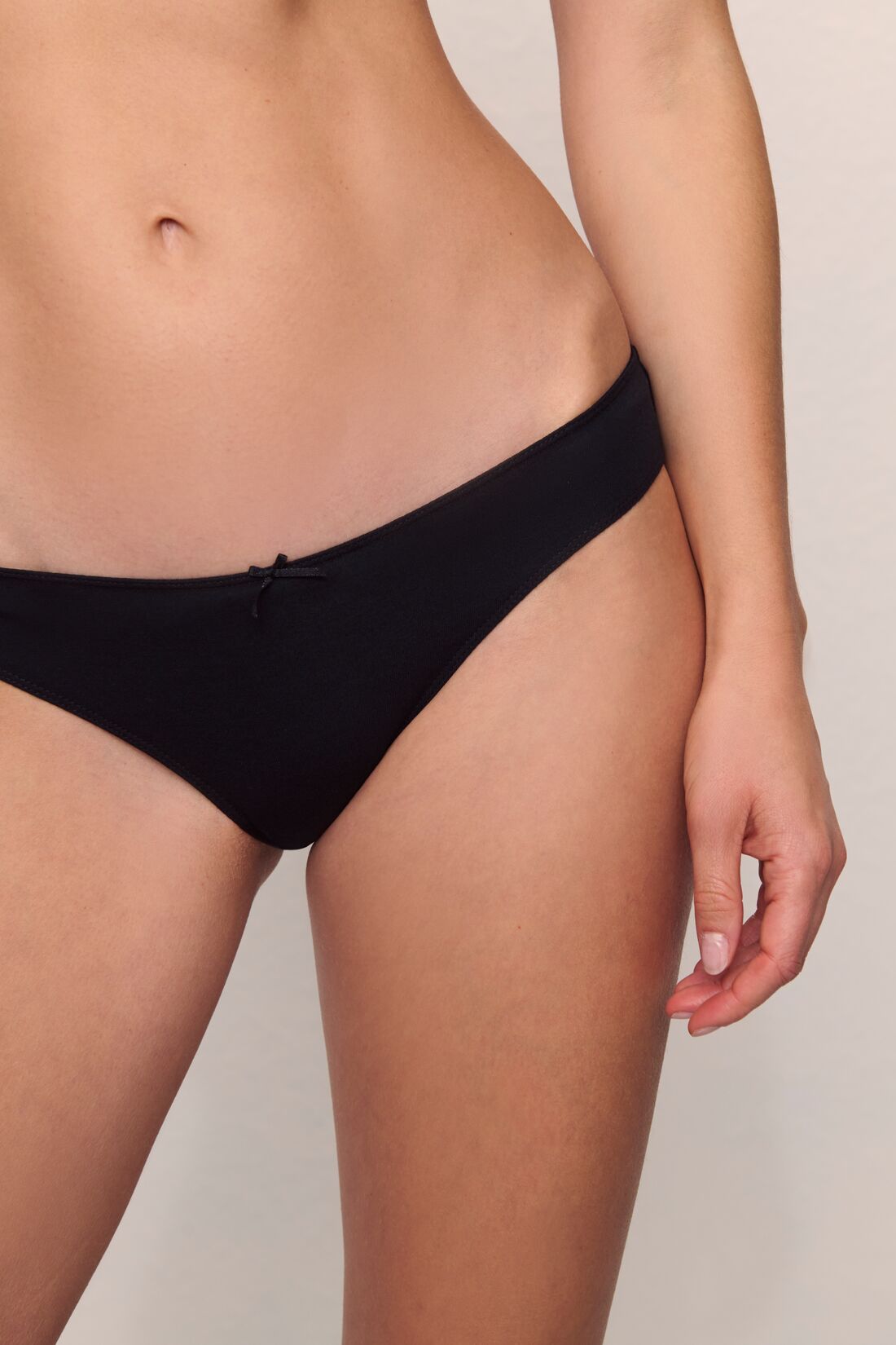 Model is wearing Pima Stretch Cotton Bikini in black