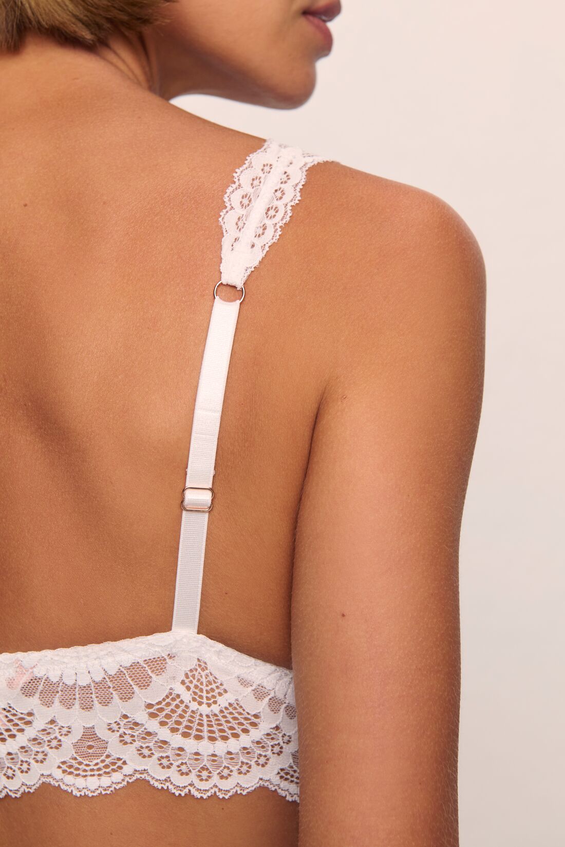 Model wears Mariana Bralette in White