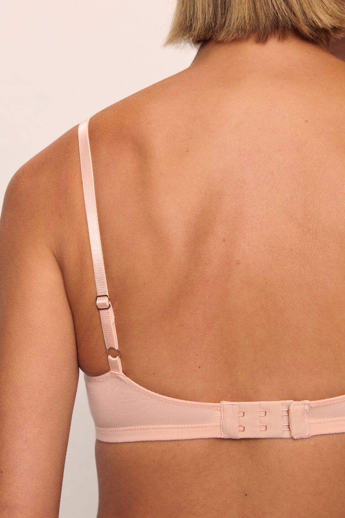 Model is wearing Pima Stretch Cotton Bralette in Buff