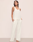 Model is wearing Gisele TENCEL™ Modal Everyday Tank in ivory.