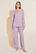 Model wears Gisele TENCEL™ Modal Long PJ Set in lavender/ivory.