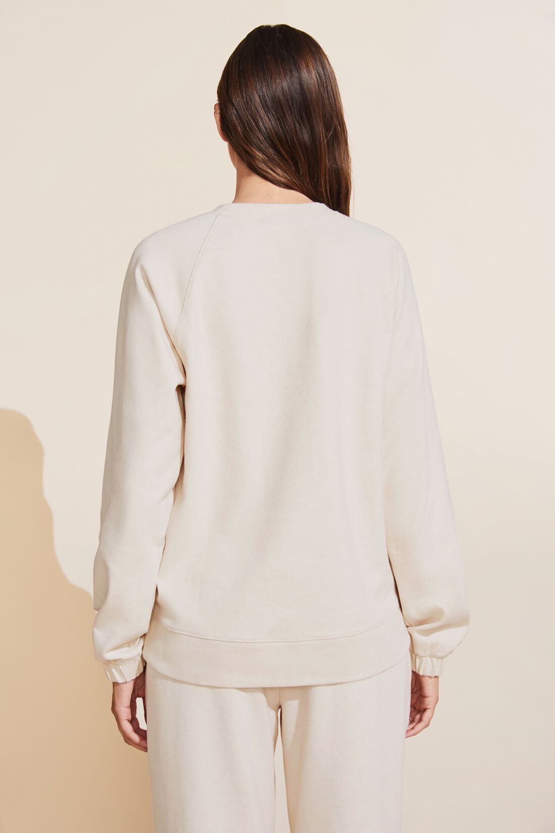 Model wears Luxe Sweats Sweatshirt in Botanical Oat.