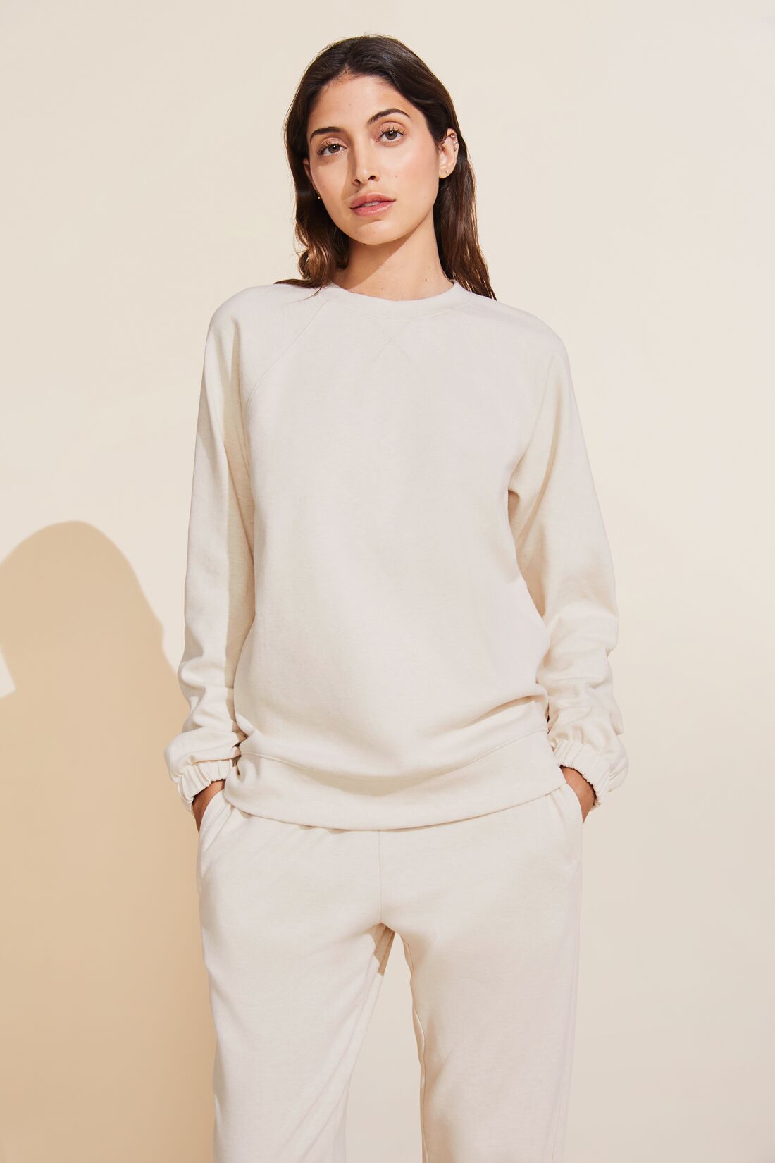 Model wears Luxe Sweats Sweatshirt in Botanical Oat.