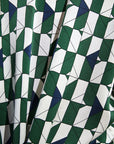 Model wears Inez Washable Silk Printed Long PJ Set in Mosaic Tile Forest Green/Navy.
