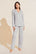 Model wears Gisele TENCEL™ Modal Rib Long PJ Set in light heather grey.