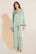 Model wears Inez Washable Silk Long PJ Set in Surf Spray/Agave.