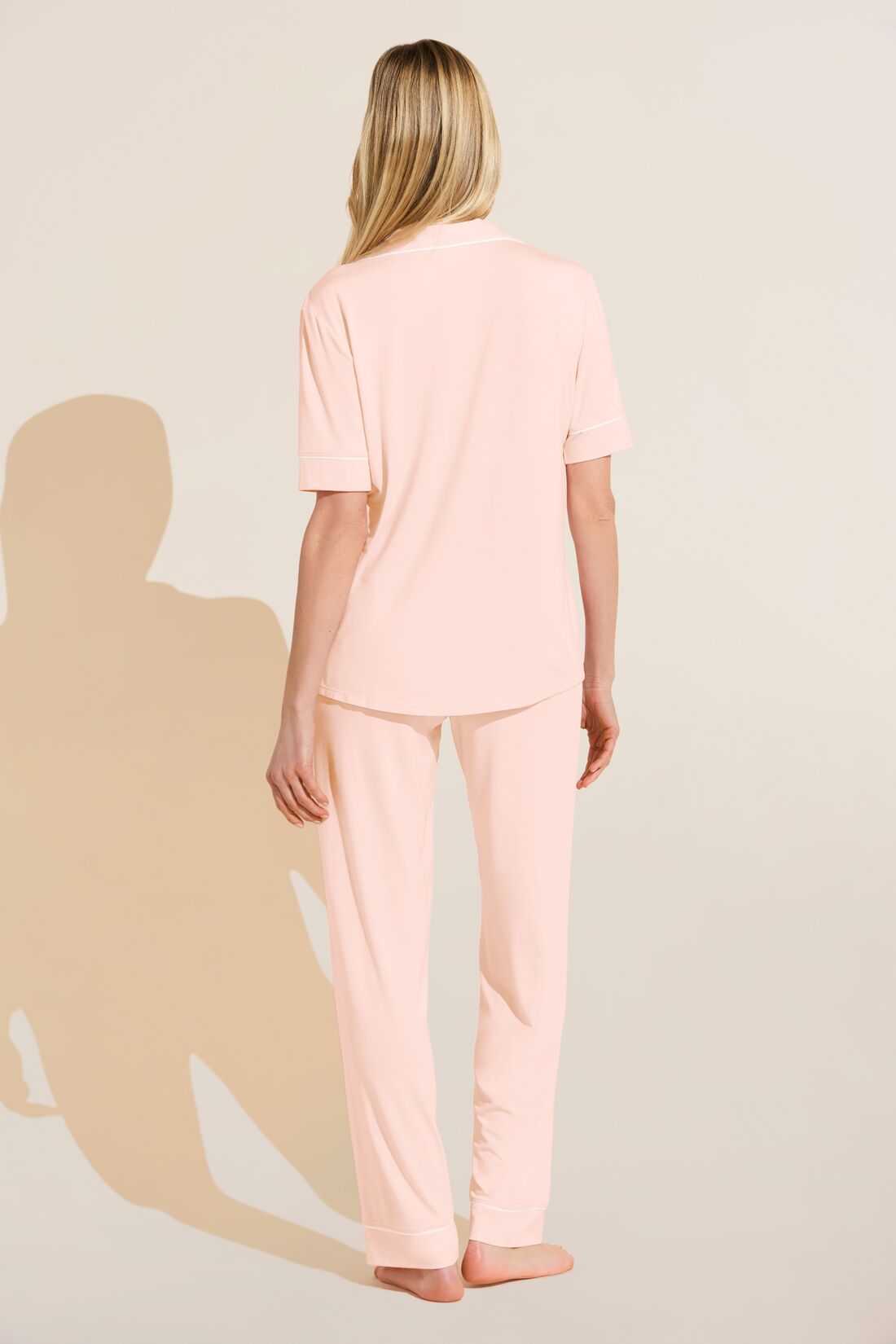 Model wears Gisele TENCEL™ Modal Short Sleeve & Pant PJ Set in petal pink/ivory.