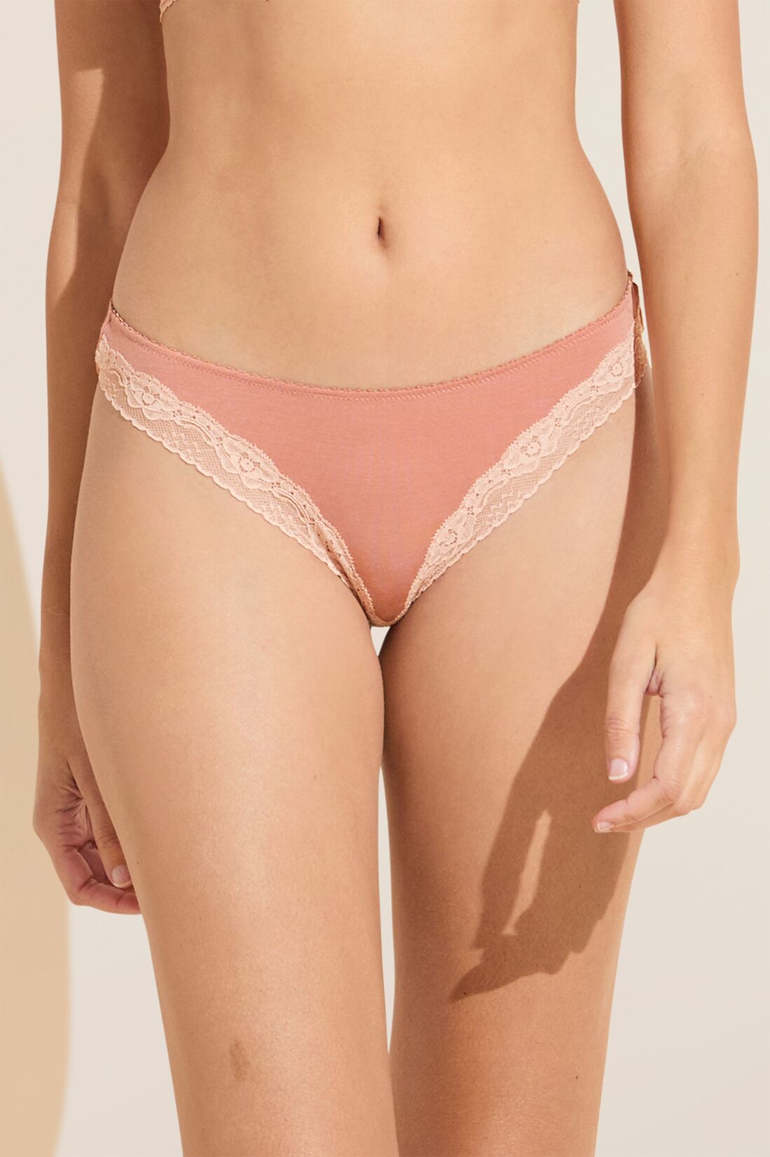 Model wears Flora TENCEL™ Modal Thong in Pink Rouge/Rose.