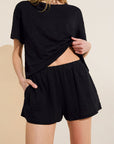 Model wears Organic Linen Knit Short in Black.