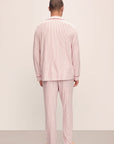 Model wears William Printed TENCEL™ Modal Long PJ Set in Duo Stripe Haute Red/Haute Red.