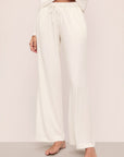 Model is wearing Gisele Tencel™ Modal Everyday Straight Leg Pant in Ivory