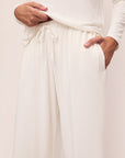 Model is wearing Gisele Tencel™ Modal Everyday Straight Leg Pant in Ivory