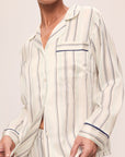Model is wearing Inez Washable Silk Printed Long Pj Set in Serene Stripe Navy/Navy