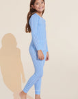 Model wears Kids Printed TENCEL™ Modal Unisex Long PJ Set in Nordic Stripes Vista Blue/Ivory.