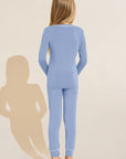 Model wears Kids TENCEL™ Modal Unisex Long PJ Set in Wedgewood Blue/Ivory.