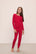 Model wears Kids TENCEL™ Modal Unisex Long PJ Set in Haute Red/Ivory.