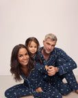 Model wears Kids Printed TENCEL™ Modal Unisex Long PJ Set in Woodland Pine Navy/Ivory.