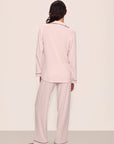 Model is wearing Gisele TENCEL™ Modal Long PJ Set in Sorbet Pink/Black