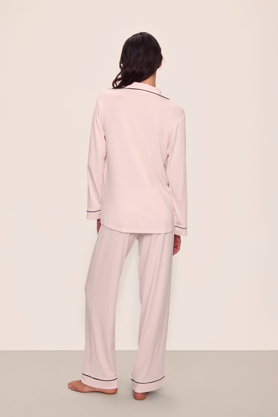Model is wearing Gisele TENCEL™ Modal Long PJ Set in Sorbet Pink/Black