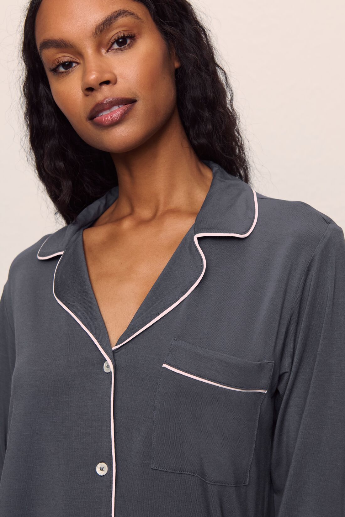 Model is wearing Gisele TENCEL™ Modal Long PJ Set in Graphite/Sorbet Pink