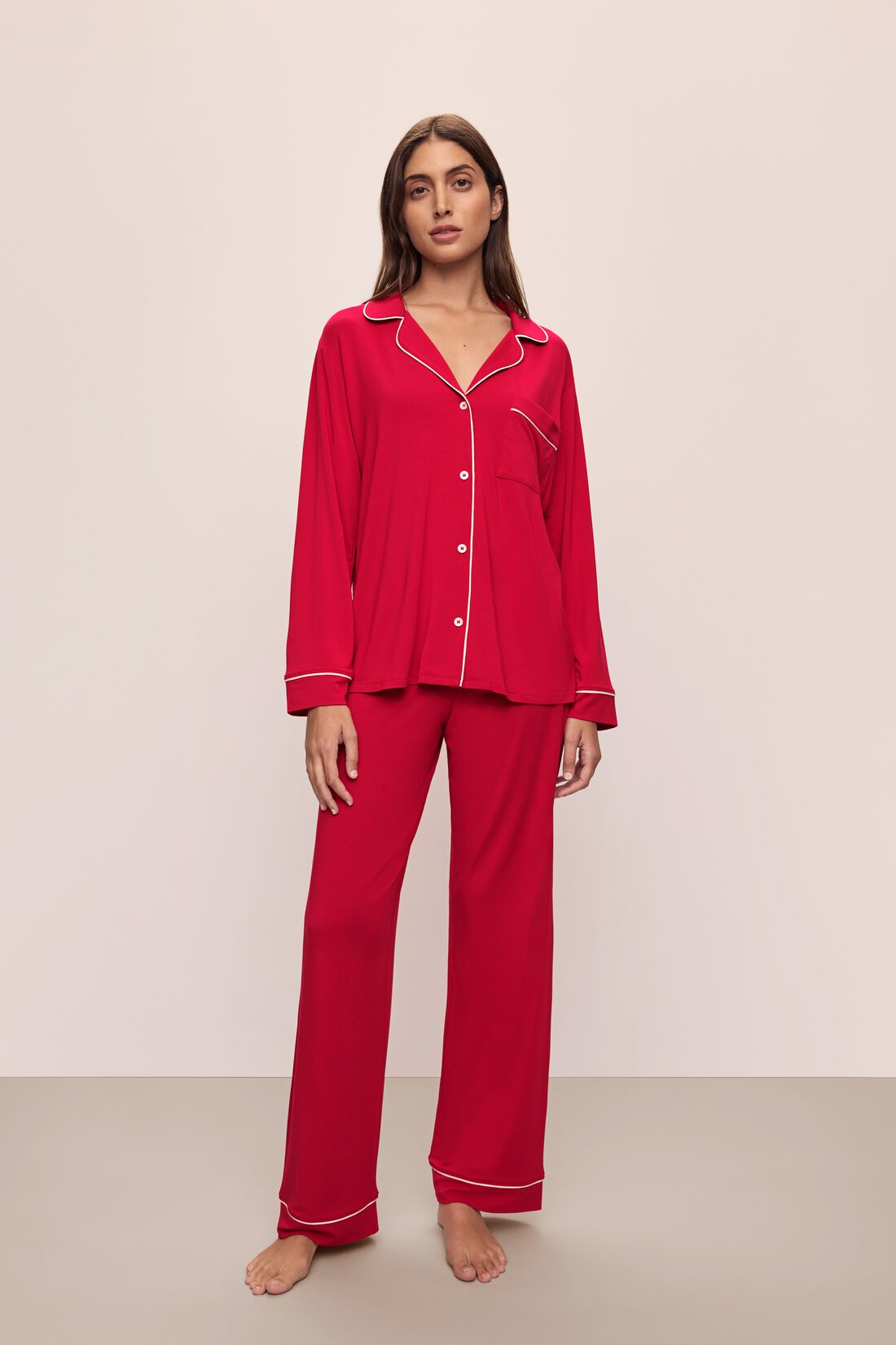 Model wears the Gisele TENCEL™ Modal Long PJ Set in Haute Red/Ivory.