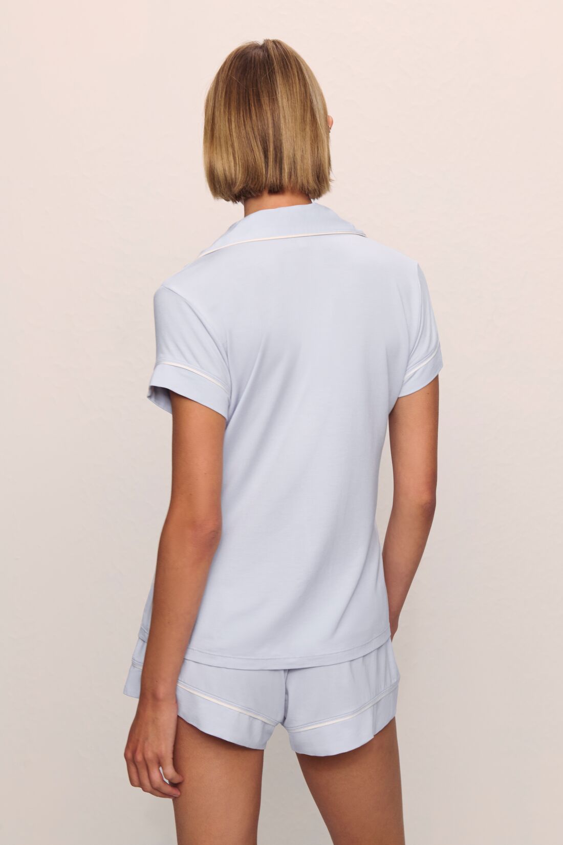 Model is wearing Gisele TENCEL™ Modal Shortie Short PJ Set in Ice Blue/Ivory