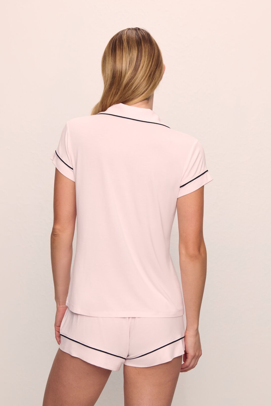 Model is wearing Gisele TENCEL™ Modal Shortie Short PJ Set in Sorbet Pink/Black