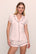 Model is wearing Gisele TENCEL™ Modal Shortie Short PJ Set in Sorbet Pink/Black